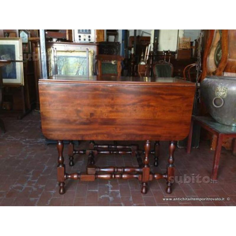 Antico tavolo meccanico allungabile