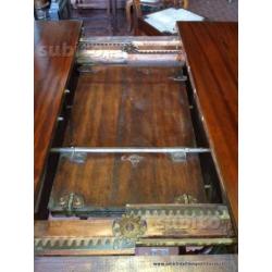 Antico tavolo meccanico allungabile